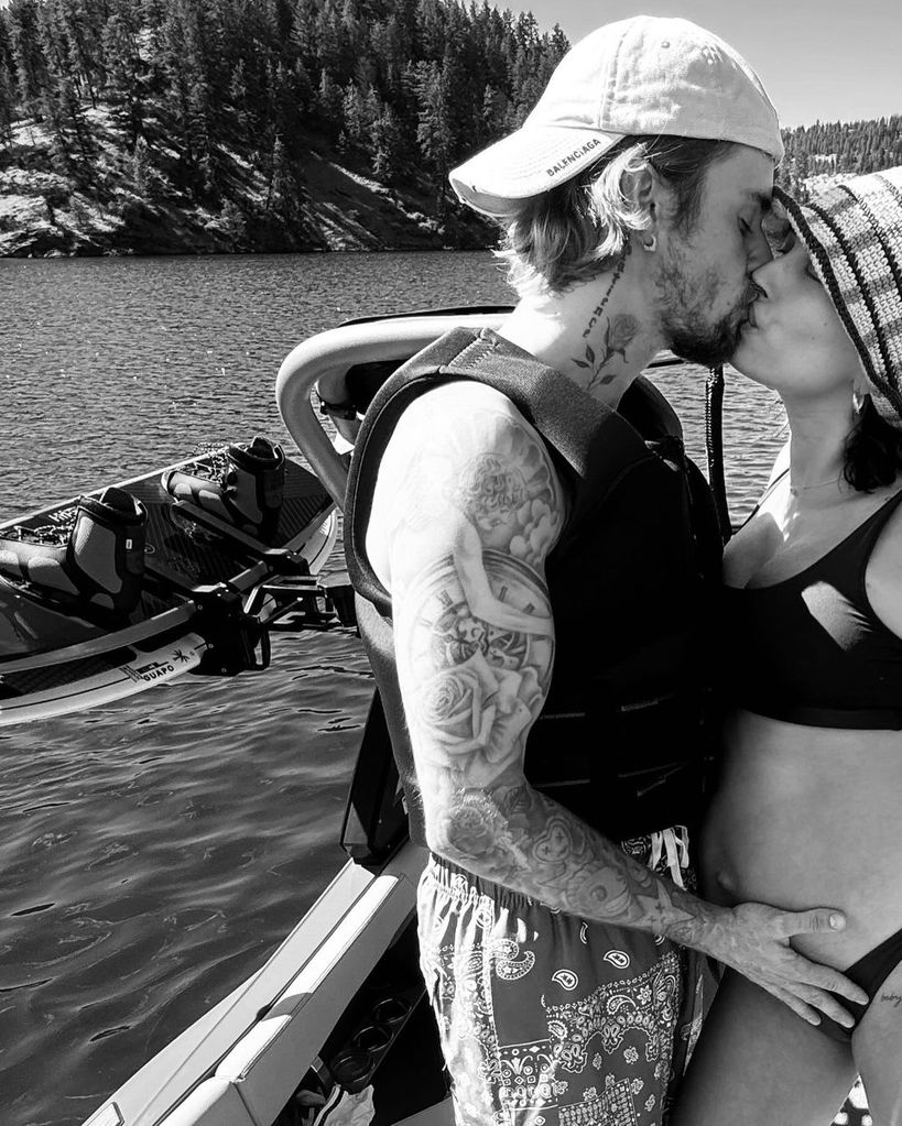 Justin Bieber and Hailey kiss on a boat