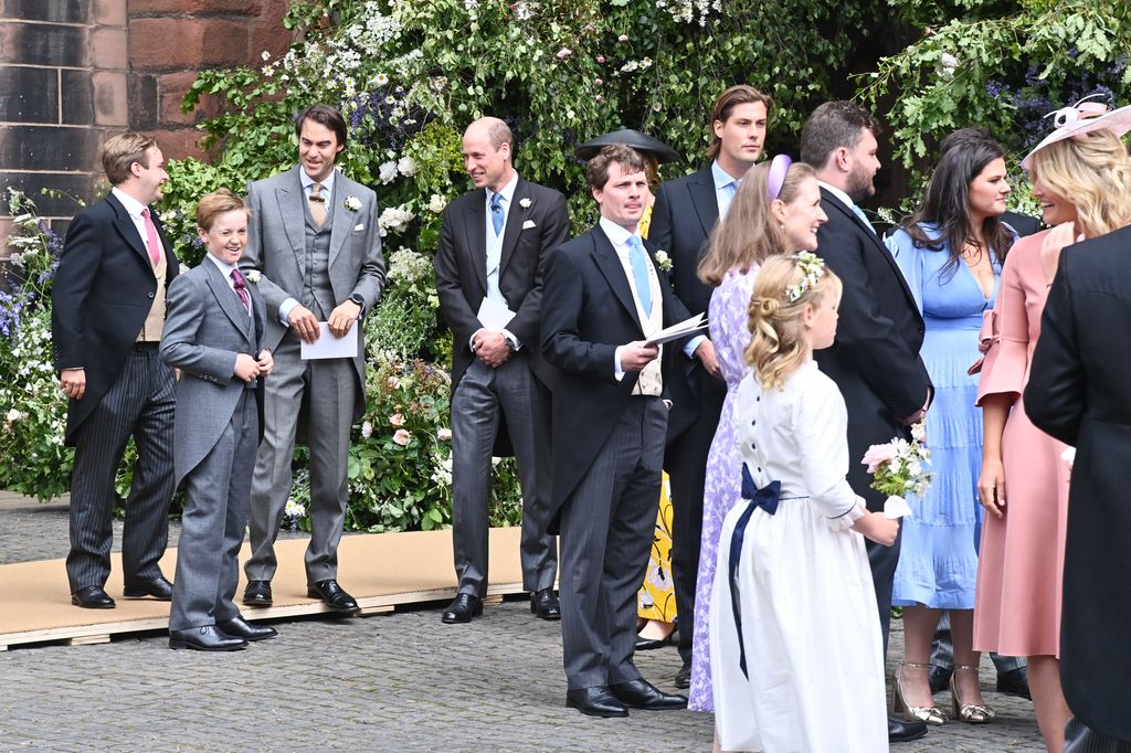 William, Prince of Wales (fourth from left) and guests attend the wedding of The Duke of Westminster and Miss Olivia Henson