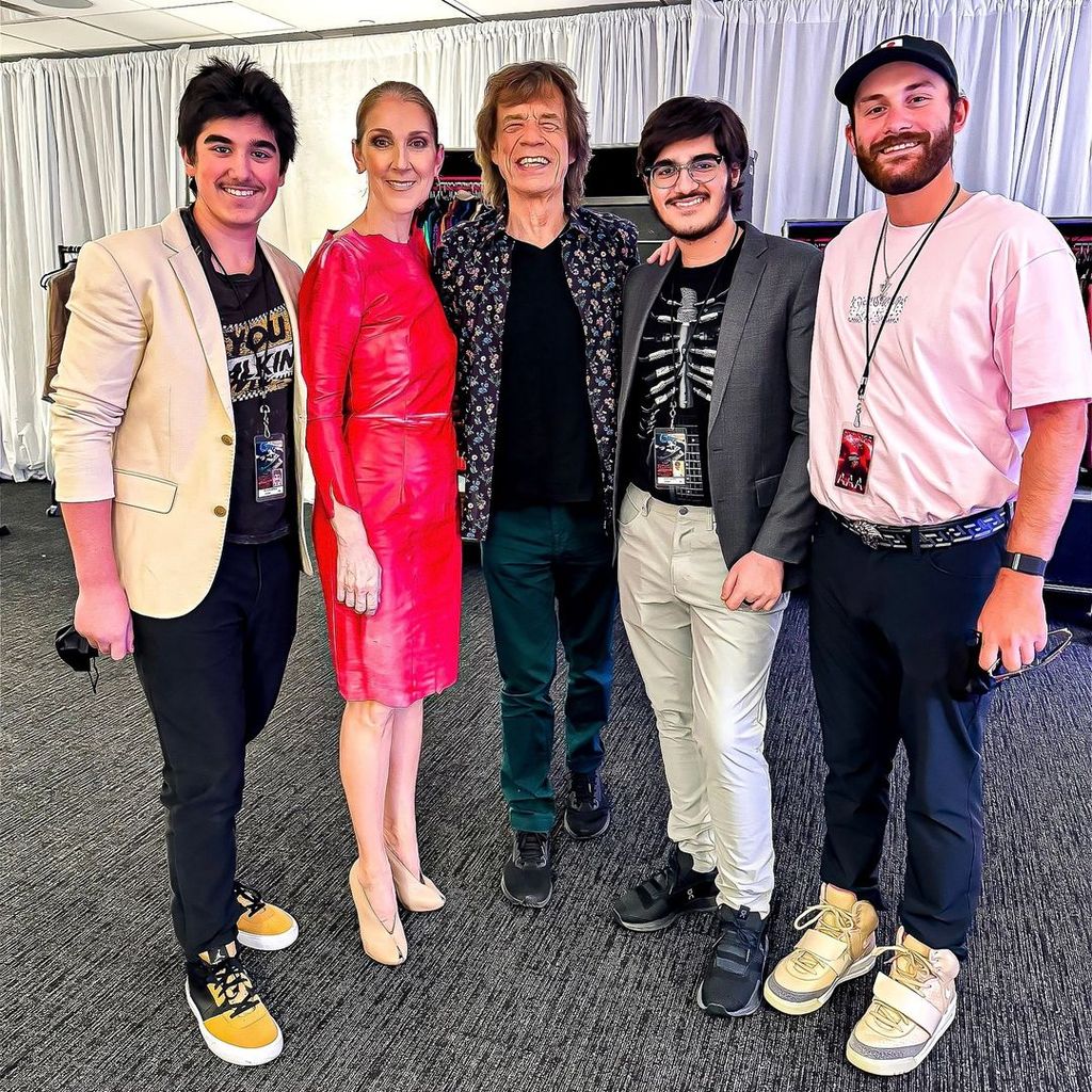 Celine Dion and her three sons at a The Rolling Stones concert, pictured backstage with Mick Jagger