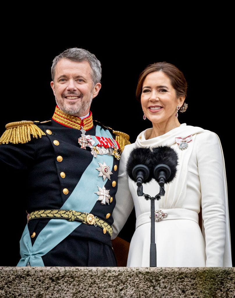 King Frederik and Queen Mary on palace balcony