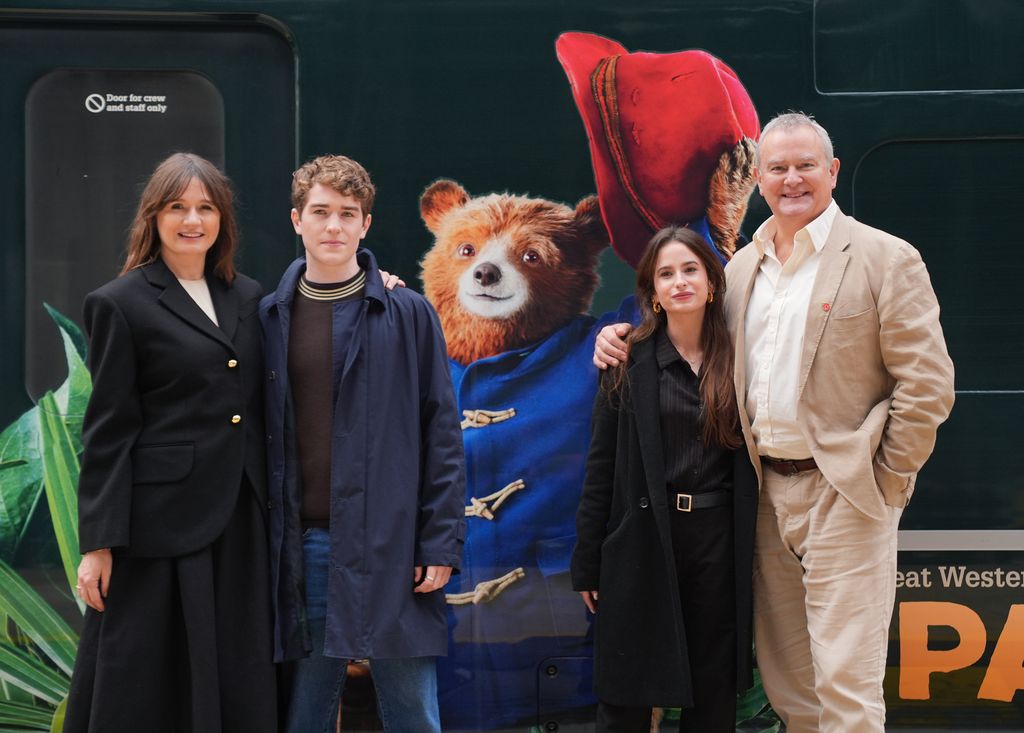 Emily Mortimer, Samuel Joslin, Madeleine Harris and Hugh Bonneville during the photo call for the unveiling of Great Western Railway's Paddington in Peru train