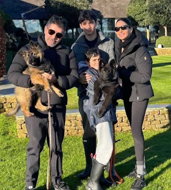 Simon Cowell with his sons and fiancée Lauren plus their new dog Pebbles