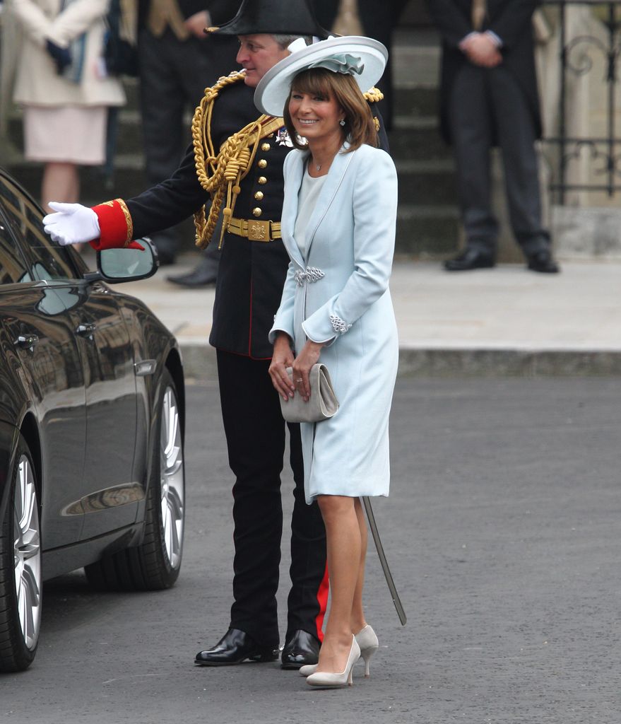 Carole Middleton by car in blue coat dress