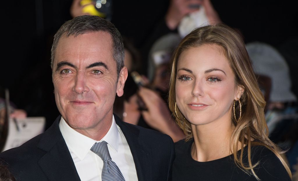 James Nesbitt in a suit and tie with eldest daughter Peggy in a black dress
