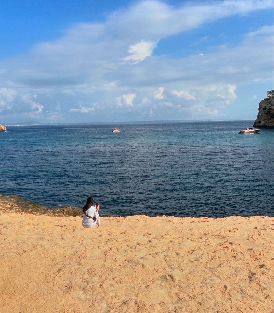 woman sitting at beach 