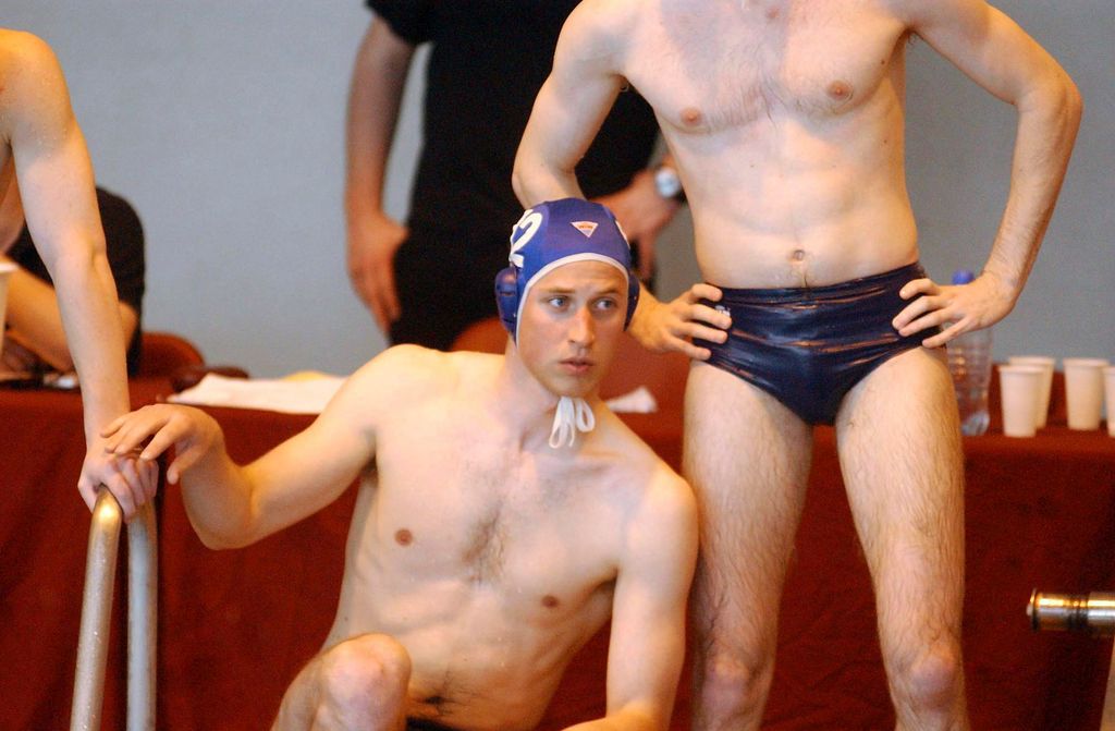 Prince William getting into the pool during a match of water polo