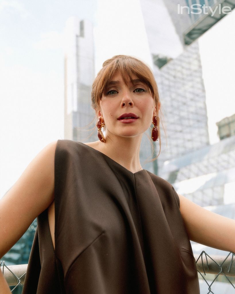 Elizabeth Olsen in a chic brown dress