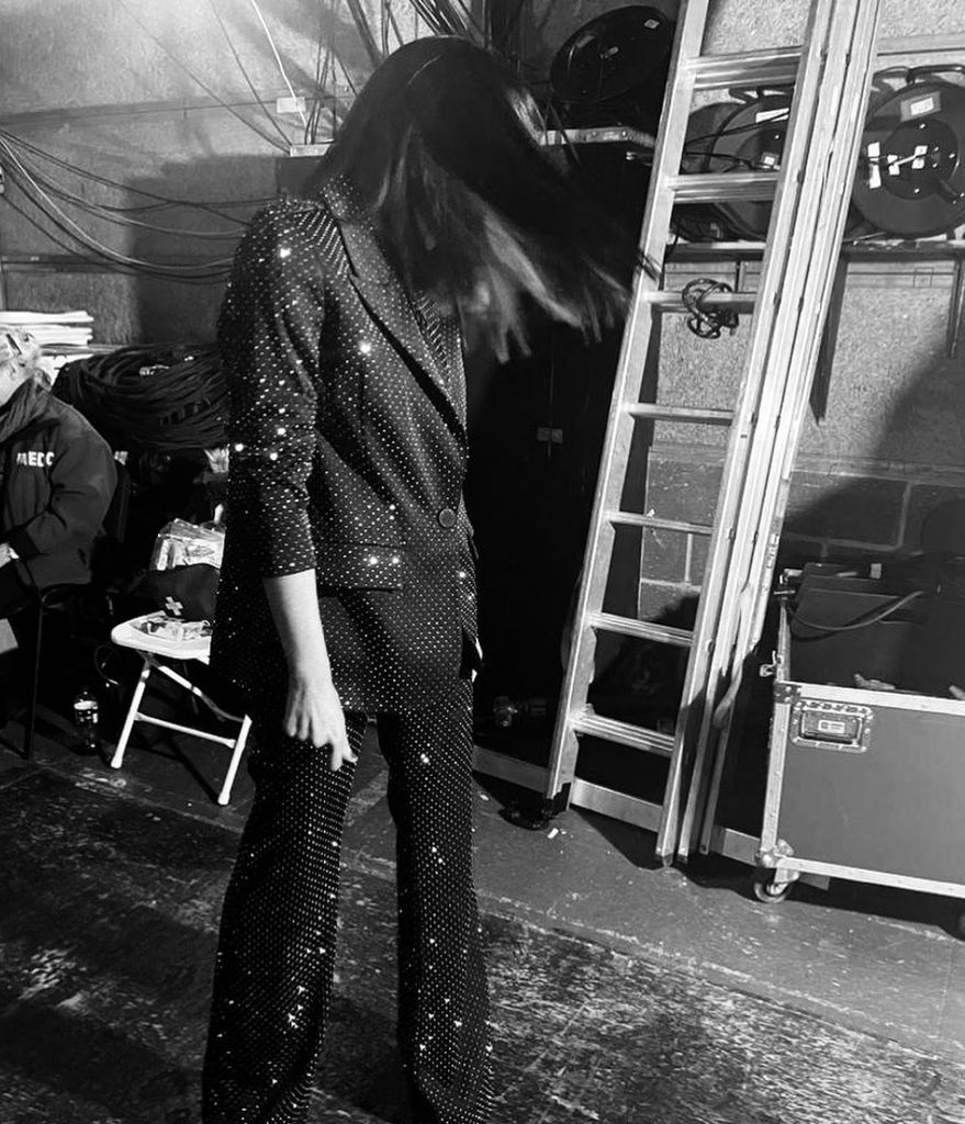 Claudia Winkleman wearing a black sparkly suit on Strictly Come Dancing