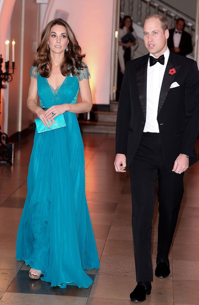 kate in teal dress beside william in black tie