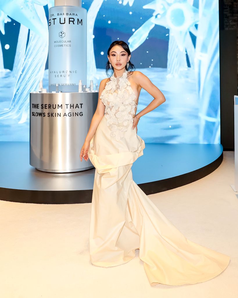 Jessica Wang in white dress