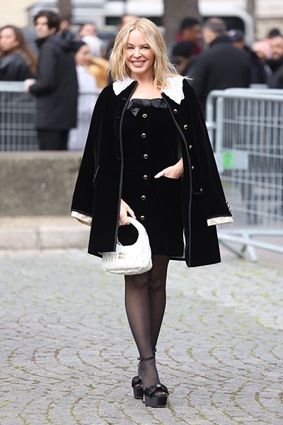 Kylie Minogue in black mini dress