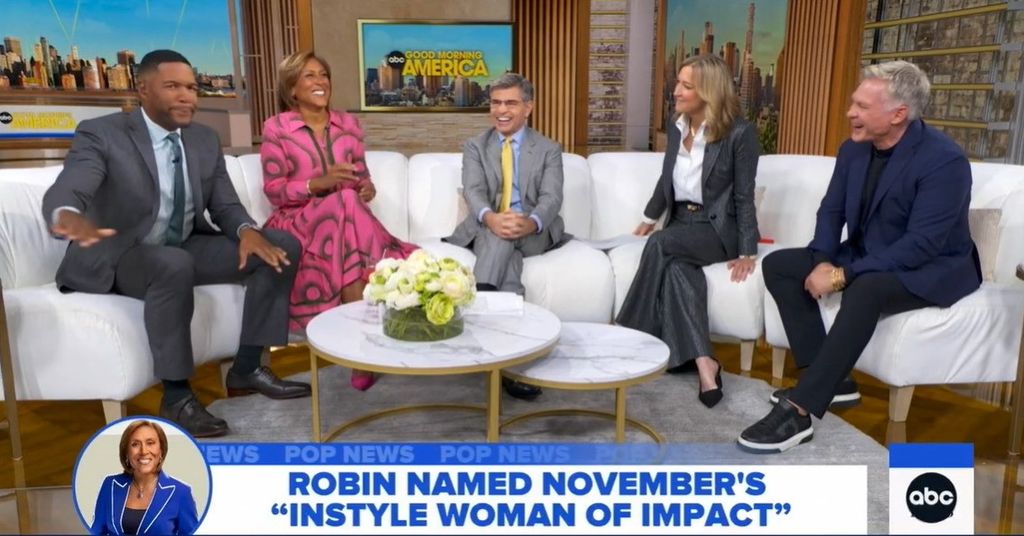 photo of gma anchors on white couch