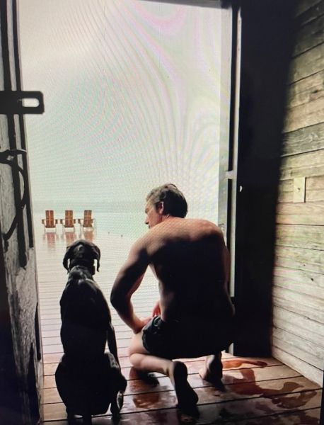 David Muir seen shirtless alongside his dog Axel near their $7 million Skaneateles Lake home