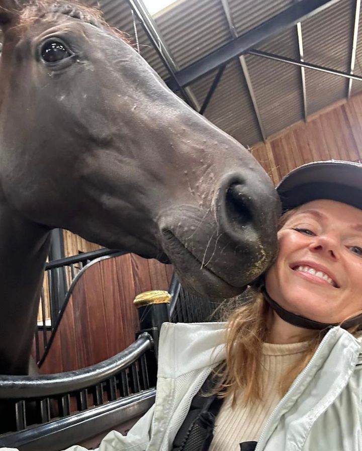 Geri Horner being kissed by horse 