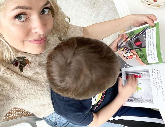 holly willoughby reading with son