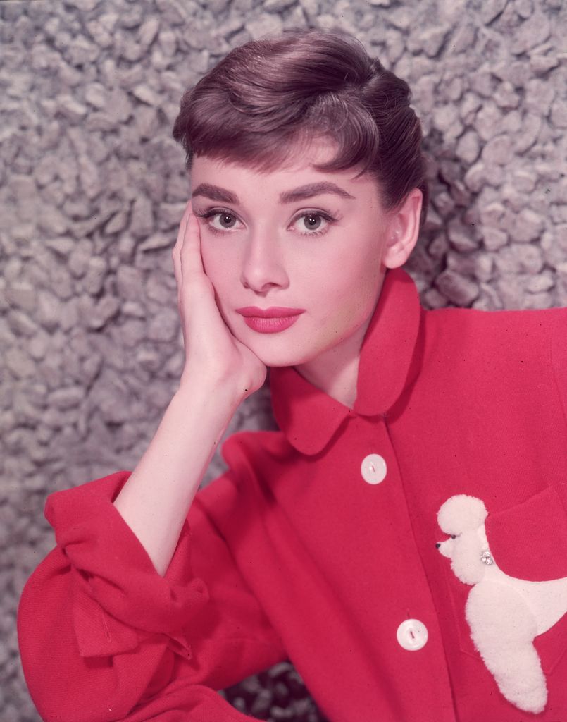 Audrey Hepburn short hair, red jacket portrait