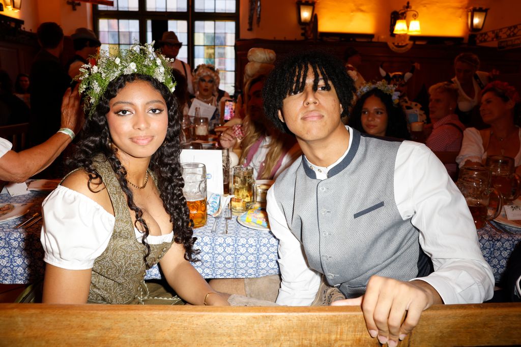 Lou Klum and Johan Samuel  during the red carpet for "Heidifest By Heidi Klum" at HofbrÃ¤uhaus Munich on September 18, 2025 in Munich, Germany