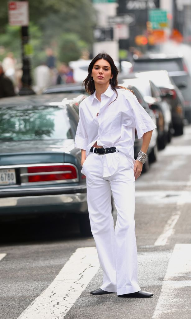 Kendall Jenner wears a crisp white shirt and jeans