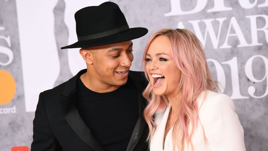 Emma Bunton and husband Jade Jones laughing together on the red carpet