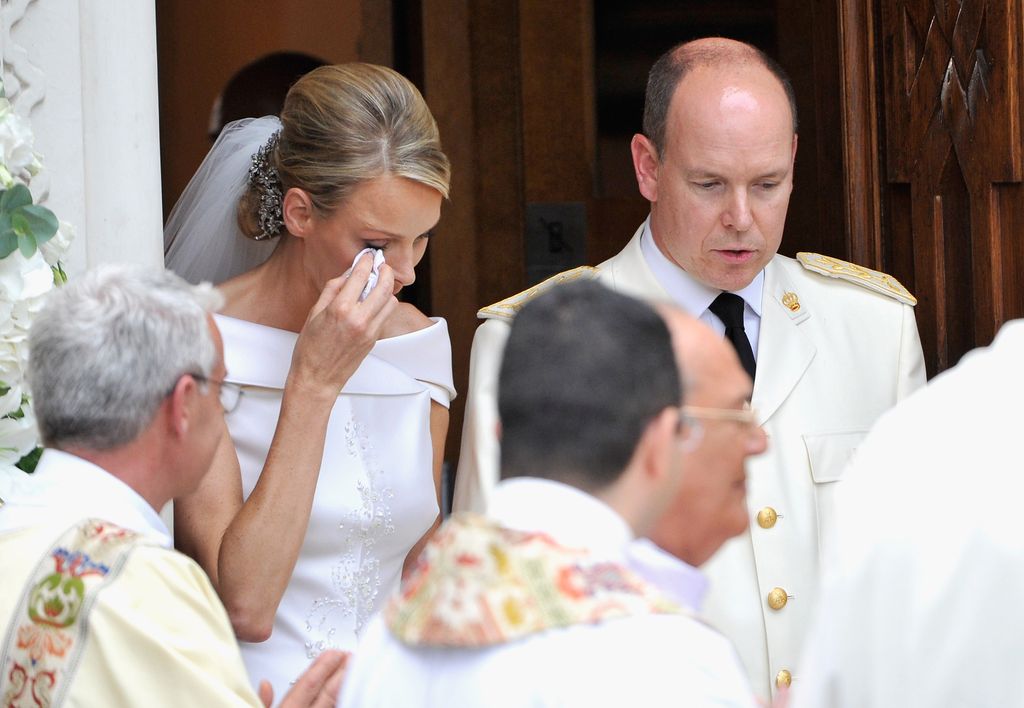 Princess Charlene wipes away a tear at royal wedding