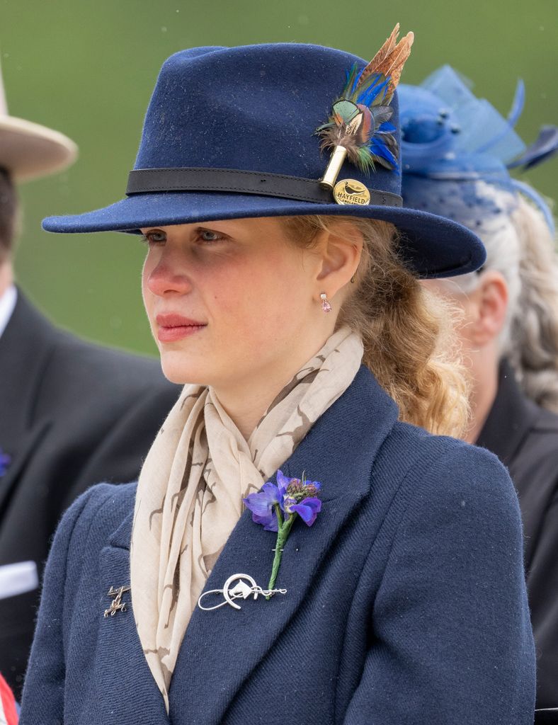 Lady Louise Windsor in a blue coat and blue hat