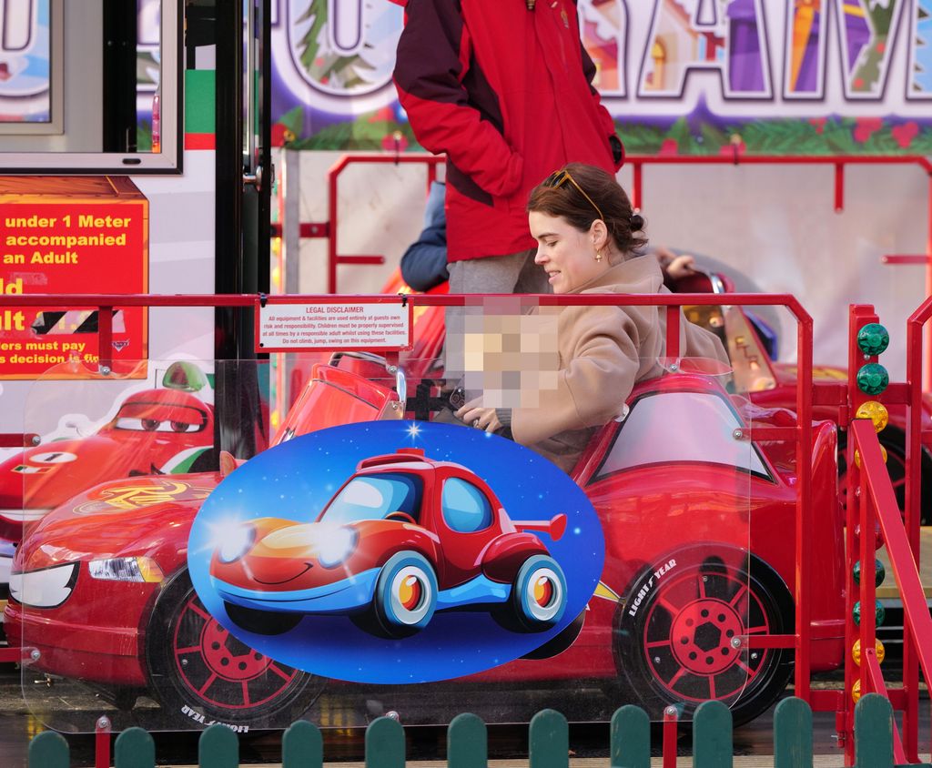 Princess Eugenie takes the family to Hyde parks Winter Wonderland for a fun day on the rides. Eugenie  pulls some funny faces as her friend films her on the childrenâs rides , then treats them to some hot dogs n pizza, followed off by some sweet treats .
Please take advice as to pixelating the childs face prior to publication.