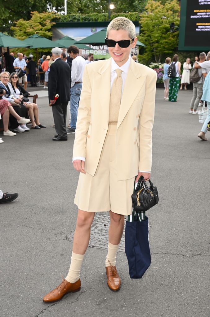 Emma Corrin in a cream suit at Wimbledon