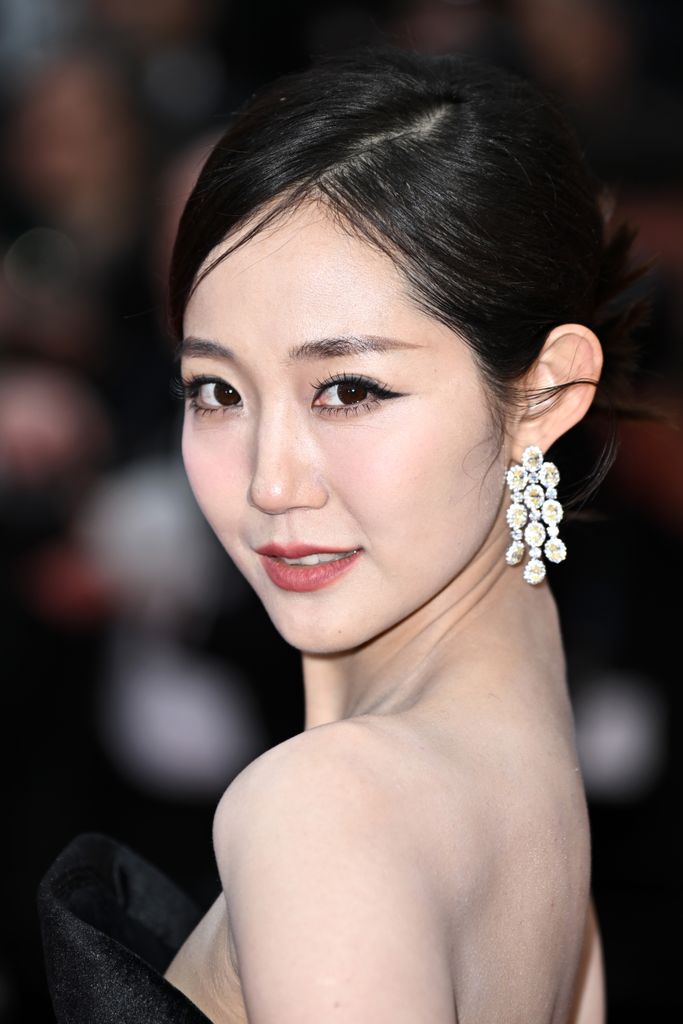Qian Hui attends "Le DeuxieÌme Acte" ("The Second Act") Screening & opening ceremony red carpet at the 77th annual Cannes Film Festival