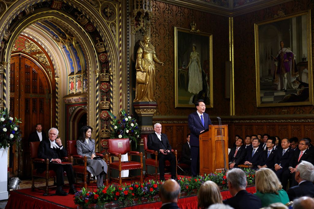 South Korea's President Yoon Suk Yeol addresses MPs in the royal gallery at the Palace of Westminster
