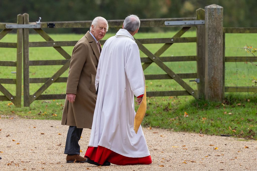 two people chatting whilst walking to church