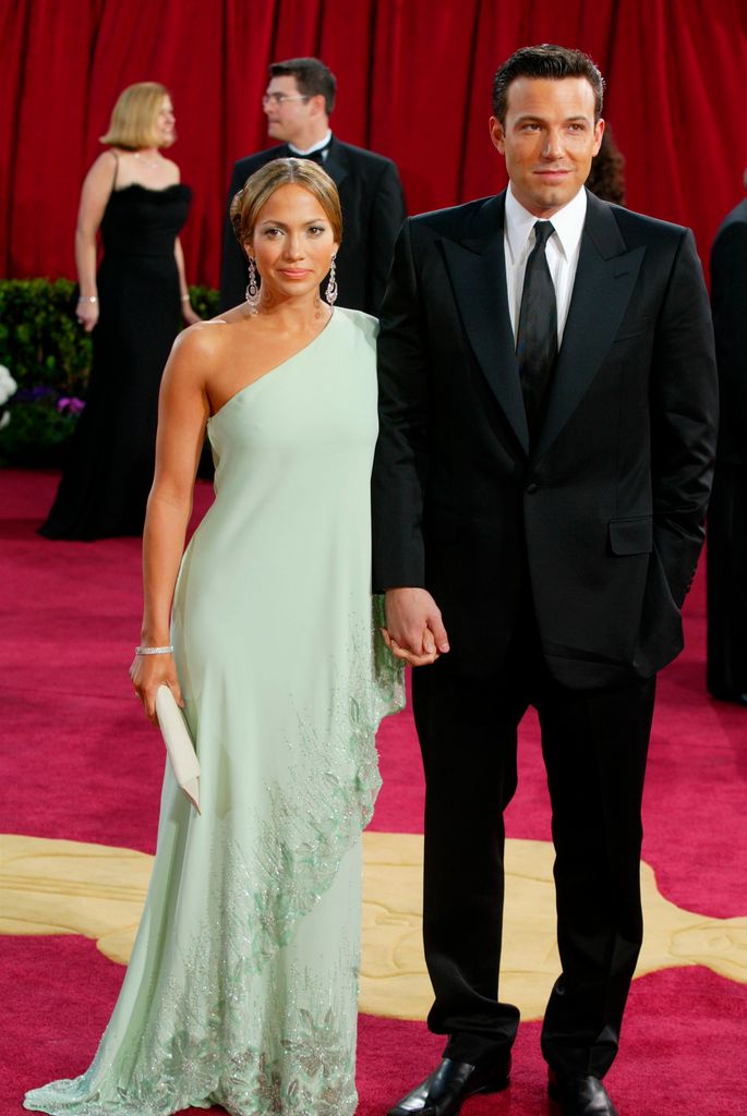 Ben Affleck and fiancee Jennifer Lopez, wearing Harry Winston jewelry, attends the 75th Annual Academy Awards at the Kodak Theater on March 23, 2003 in Hollywood, California.  (Photo by Kevin Winter/Getty Images)