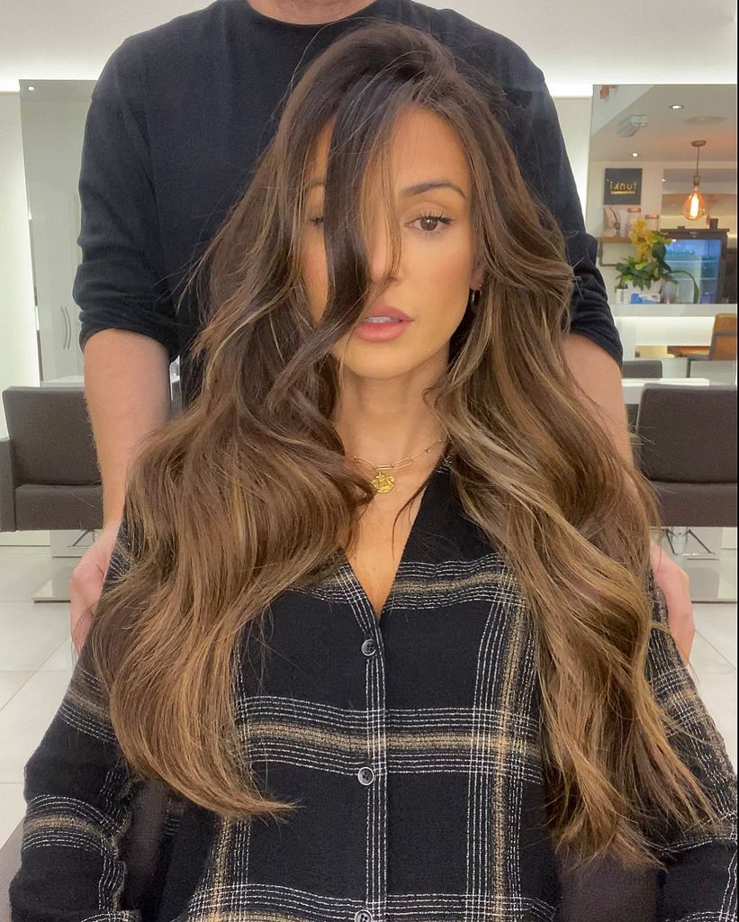 Michelle keegan with hair over face with honey highlights 