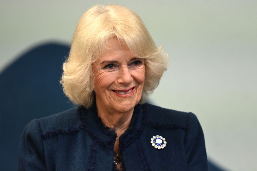 Camilla accessorises with 'vintage' £3,605 Chanel blue bag at BBC - 'blue  is her colour!