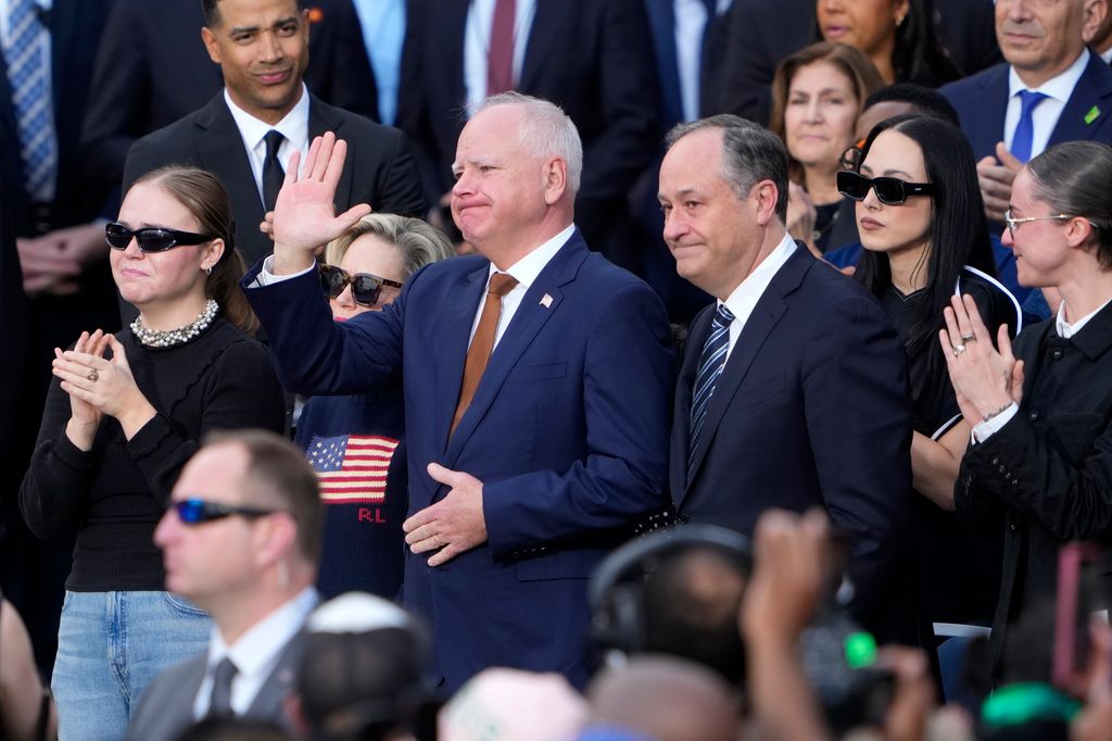 Hope Walz, Democratic vice presidential nominee, Minnesota Gov. Tim Walz, Second gentleman Doug Emhoff and Ella Emhoff react 