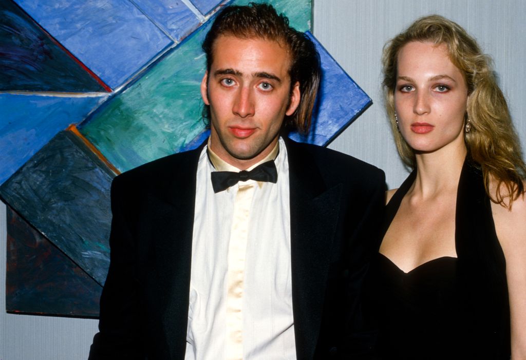 Nicolas Cage and Bridget Fonda pose for a photo circa 1987
