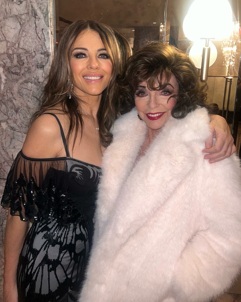 two women posing for photo 