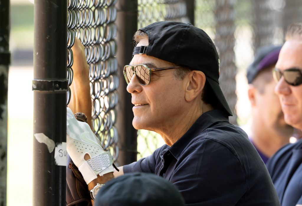 George Clooney is seen playing in the Broadway League Softball Game in Central Park for the stage adaptation of "Good Night and Good Luck" on May 01, 2025 in New York City