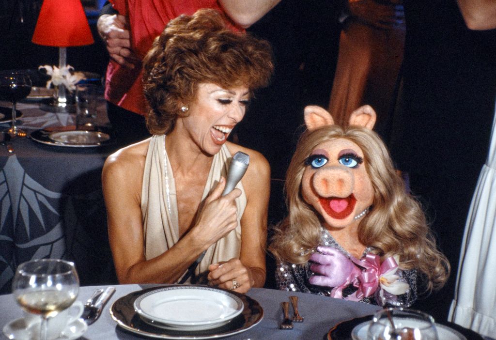 The Muppets Go Hollywood. A CBS television special, originally broadcast May 16, 1979.  Pictured from left is Rita Moreno and Muppet character Miss Piggy.