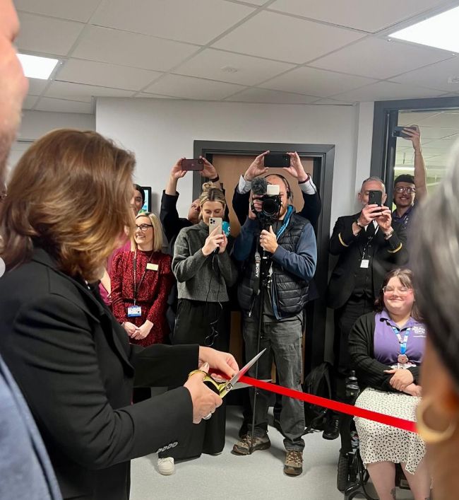 Jane McDonald cutting a ribbon at a ceremony