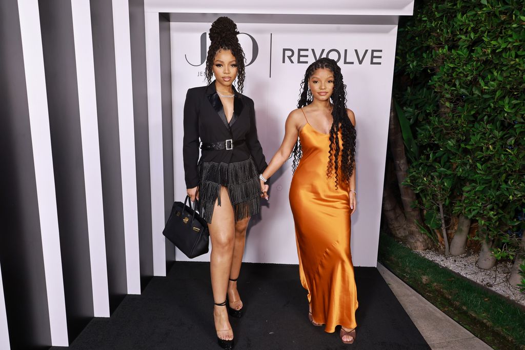 Chloe Bailey and Halle Bailey attend JLo Jennifer Lopez's launch for the Revolve Collection at a private residence on March 18, 2023 in Beverly Hills, California.