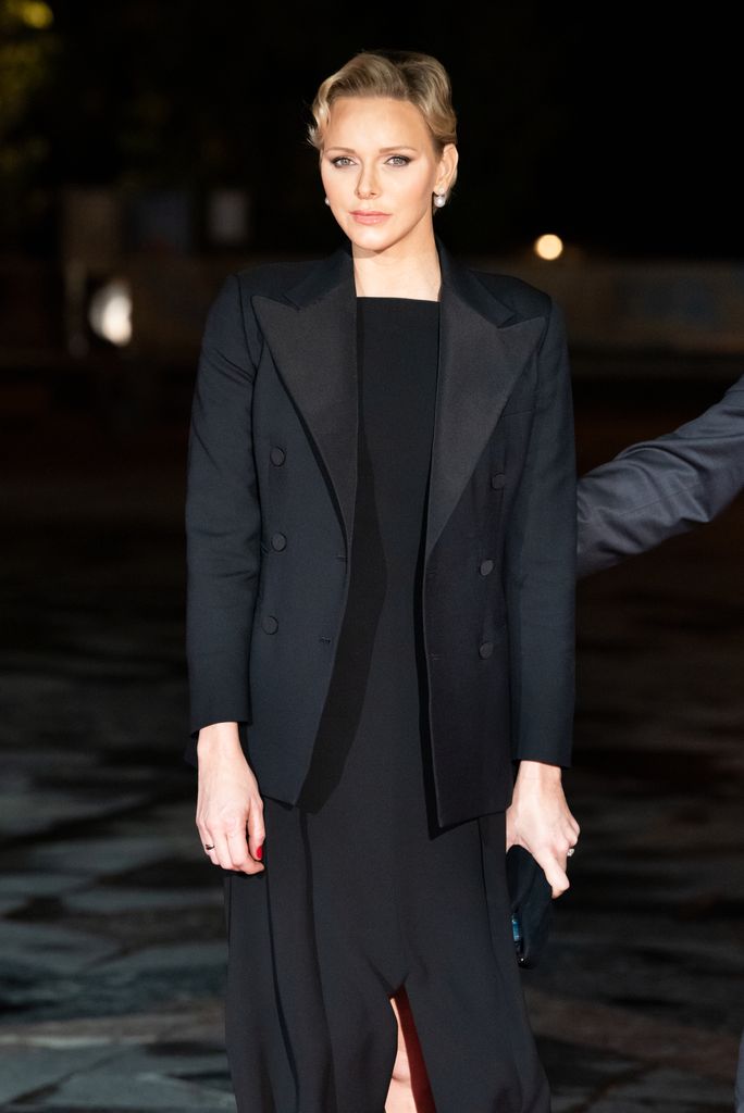 Princess Charlene of Monaco wears a black suit