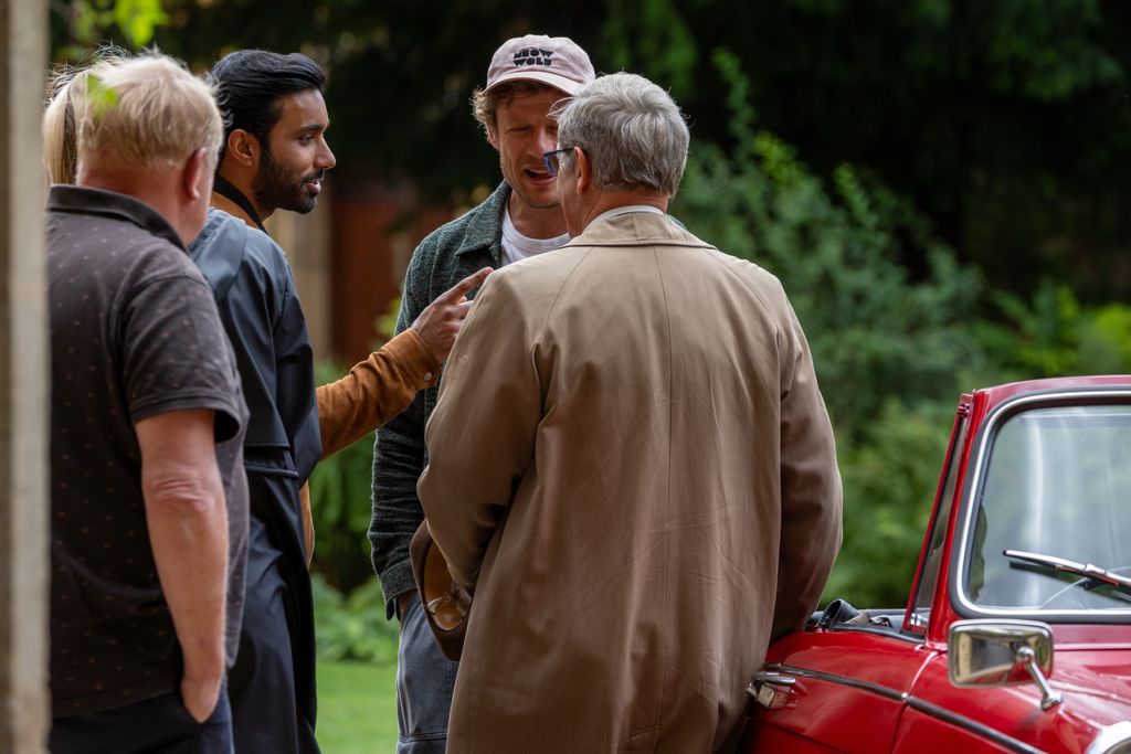James was reunited with fellow actors Rishi Nair (left) and Robson Green