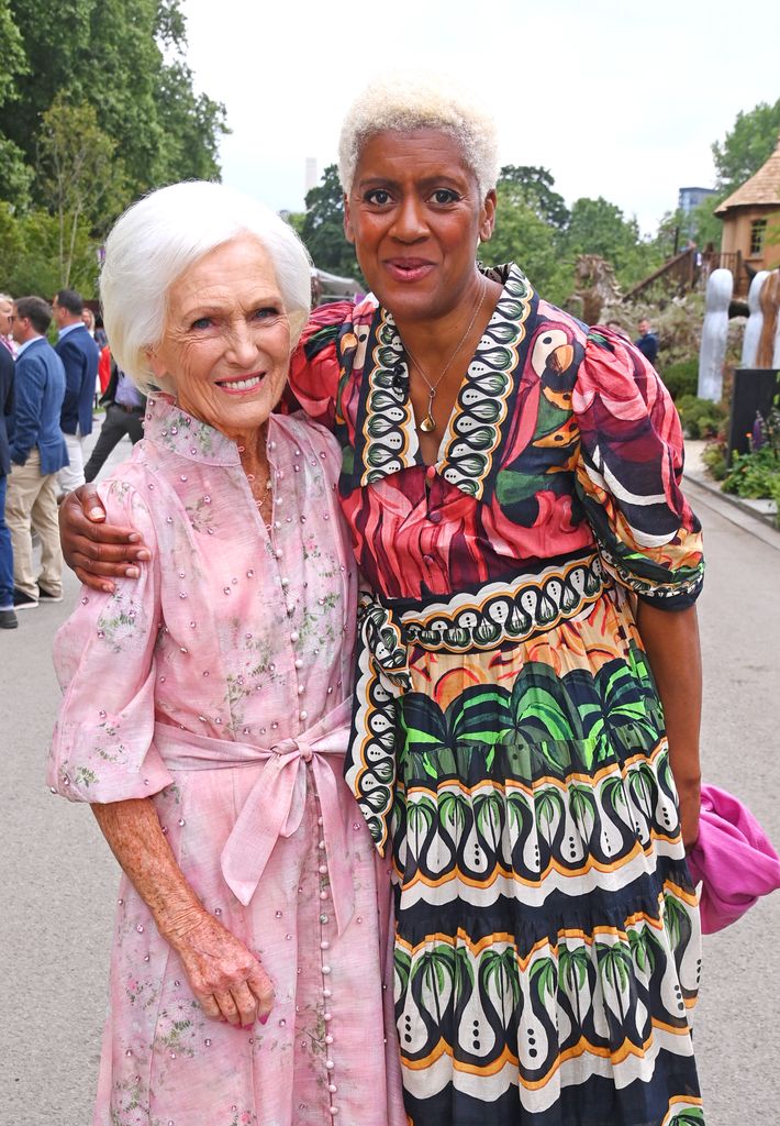 Arit Anderson with her arm around Mary Berry