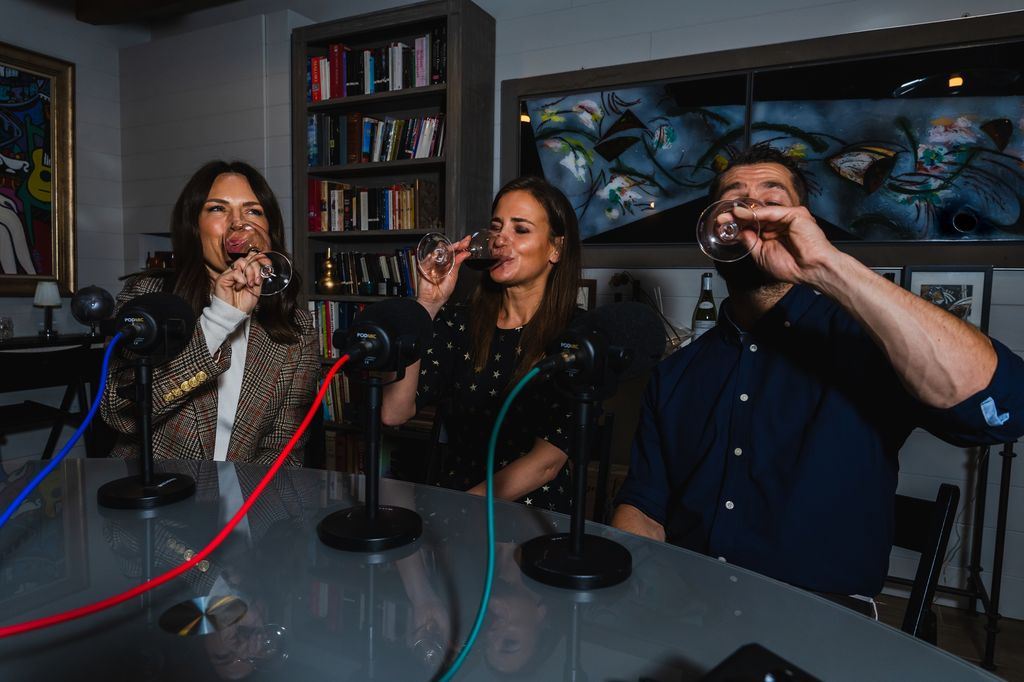 Liz Fletcher, Amelia Singer and Kelvin Fletcher drinking wine