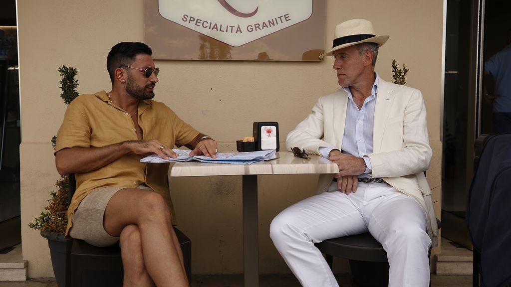 Giovanni Pernice and Anton Du Beke sitting at a table in Sicily 