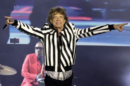 Mick performing on stage