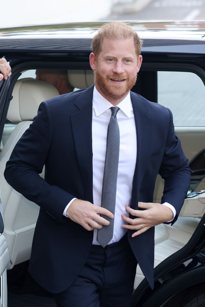 Prince Harry smiling as he arrives for WellChild Awards