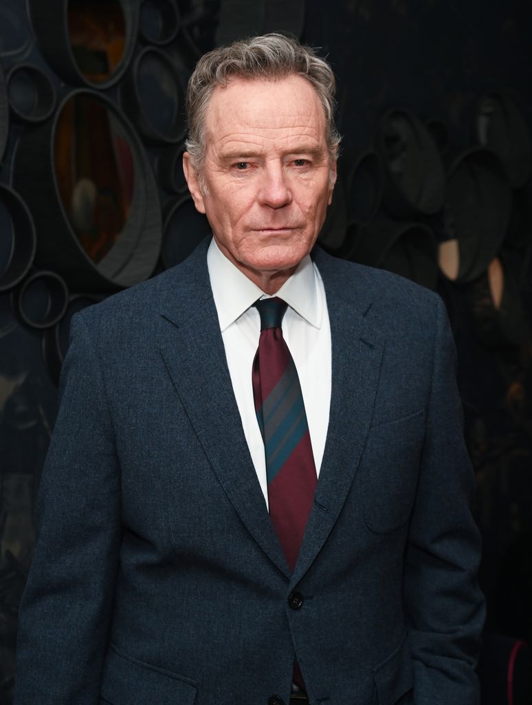 Bryan Cranston attends the press night after party for "All My Sons" at The Ham Yard Hotel wearing a suit