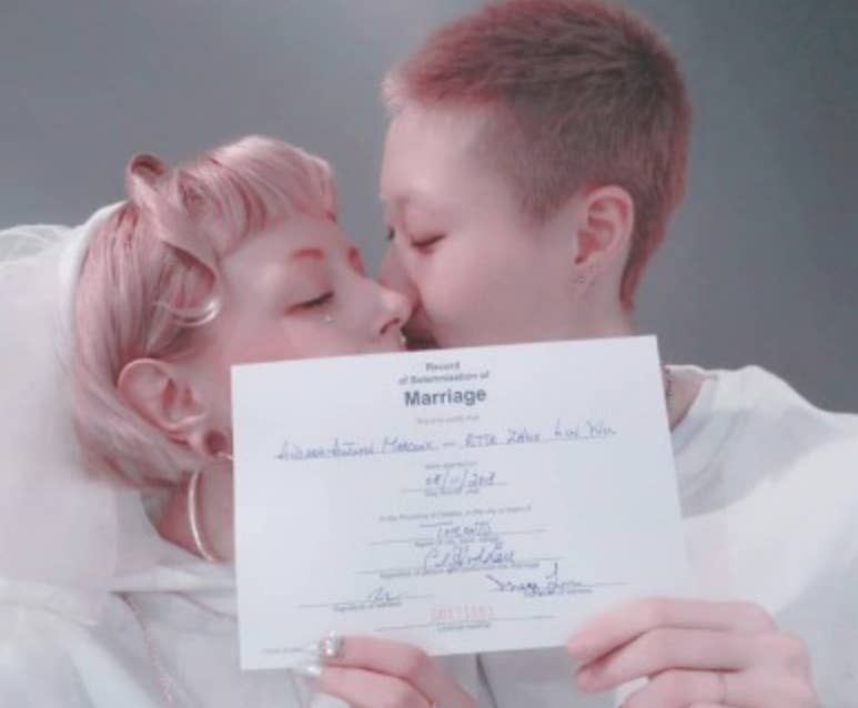Andi Autumn and Etta Ng Chok Lam announcing their marriage in a photo shared on Instagram