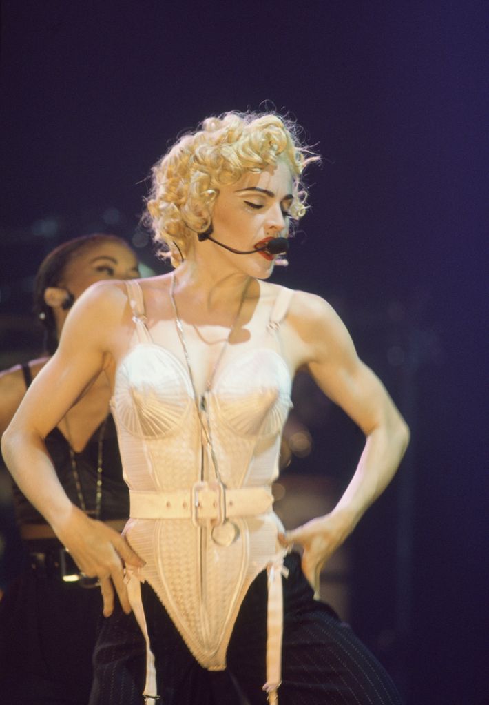 Madonna performs on stage at Paris Bercy, France on the Blond Ambition World Tour. She wears the famous outfit designed by Jean-Paul Gaultier. (Photo by THIERRY ORBAN/Sygma via Getty Images)
